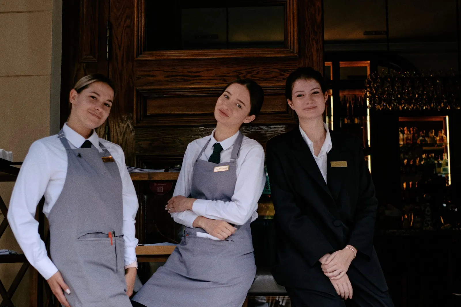 Three members of staff in a restaurant